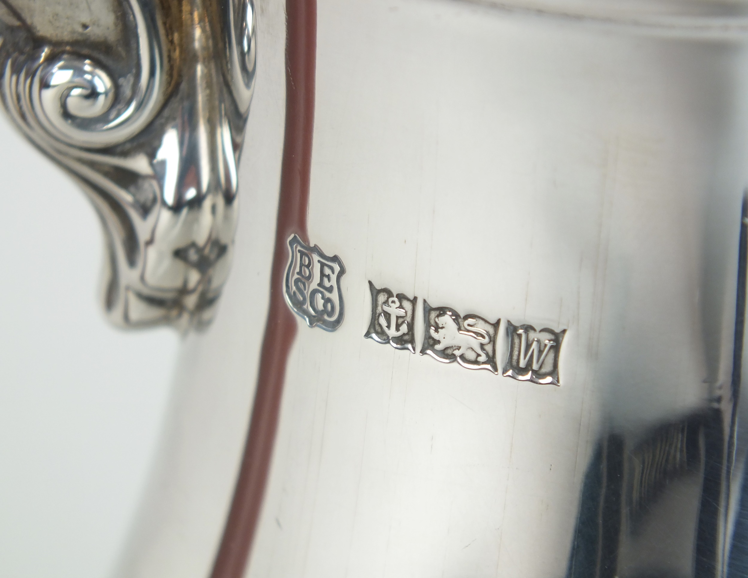 A full hallmark comprised of; the makers mark of ‘Barker Ellis Silver Company’, the anchor Assay stamp for Birmingham, the lion passant
